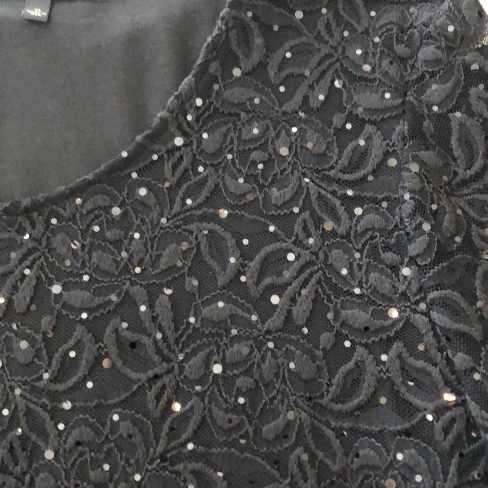 Black sequined floral lace top.